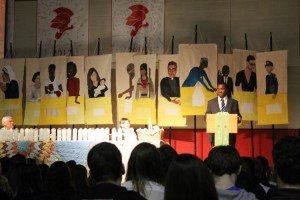 Students painted canvases of modern-day saints which were displayed behind the main table where the presiders of the prayer service sat. 