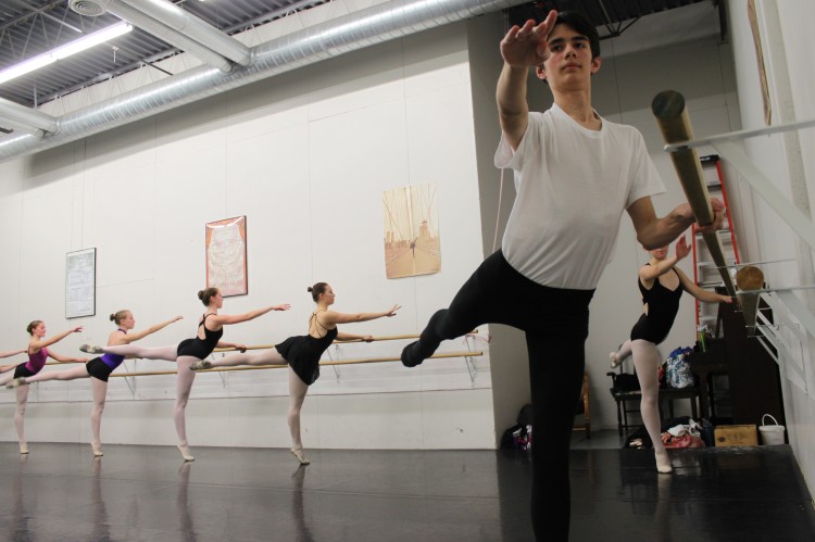 Freshman Peter Linder practices ballet, an art form often dominated by females, at the Academy of Russian Ballet. Linder recently secured the role as the Nutcracker in the studios performance of the classical Christmas ballet. 