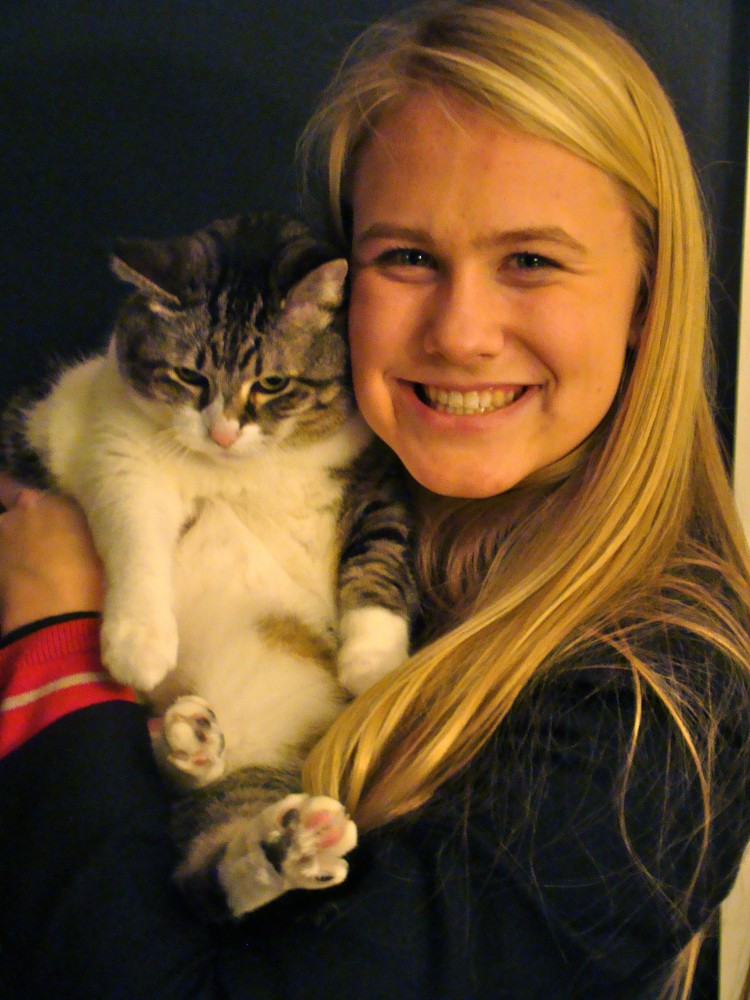 One day, senior Anne Arnason hopes that her fat cat, Sophie, will finally have the motivation to exercise. 