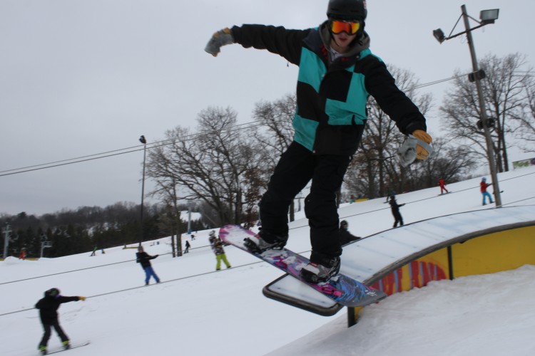 Senior Nick Lundquist demonstrates his snowboarding skills at Hyland. 