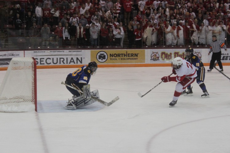 Senior Chris Hickock takes a shot during a breakaway play. 