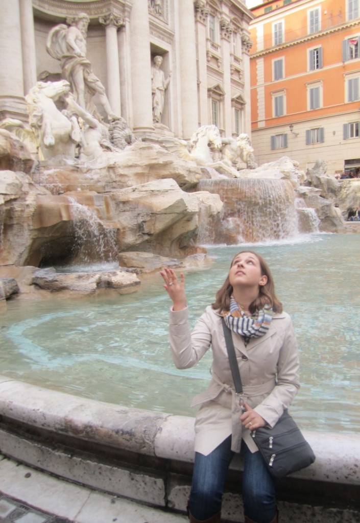 Senior Jenny Krane tosses a coin into the Trevi Fountain.