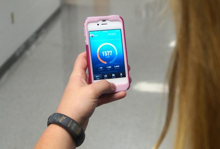 Junior Annie Applehoff uses bands to track her own exercise and health data.