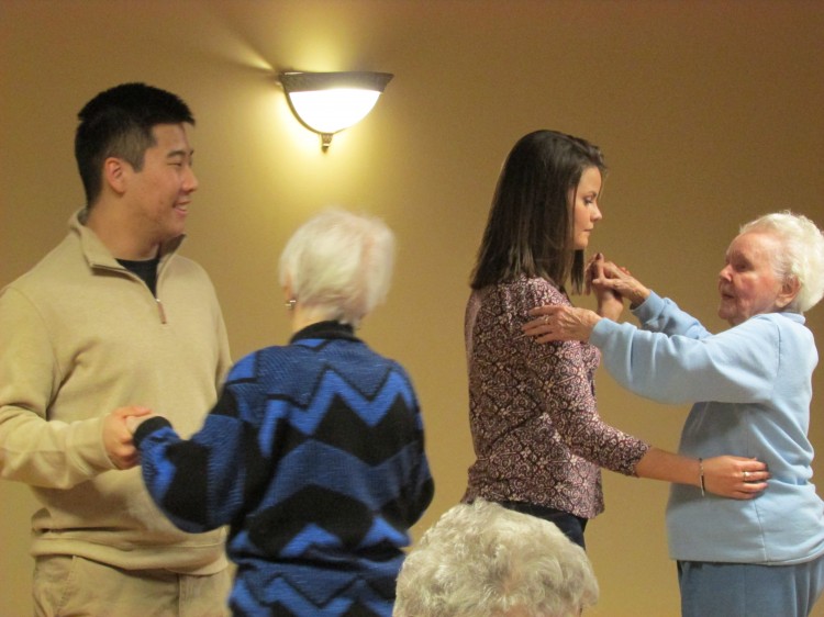 Seniors Caitlin Hood and Peter Watkins dance with residents from Parkshore Senior Campus at the National Honors Society hosted Valentines Day Dance. This event has been a constant in the Parkshore community for fourteen years. 