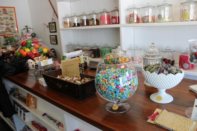 Colorful+candies+and+ornately+wrapped+chocolates+decorate+the+counter+and+walls+of+Sugar+Sugar+Candy.