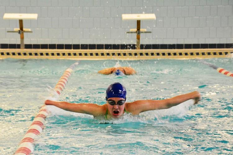 In preparation for the Paralympics competition, Sims has begun an intense and rigorous training schedule at the uptown YWCA.