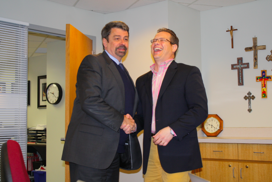 Current president Dr. Bob Tift and future president Dr. Kevin Gyolai shake hands. Dr. Gyolai will begin his duties on July 1, 2014, leading the BSM community after years working as the Dean of STEM at Inver Hills Community College.