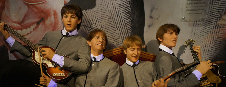 Madame Tussauds displays wax figures of popular celebrities, like The Beatles.