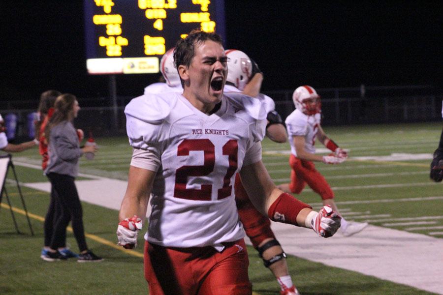 Barry celebrates the winning touchdown putting the Red Knights ahead 27-26.