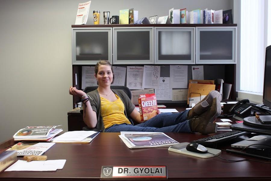 Grace Gyolai exercises her daughterly privileges at her dads office.