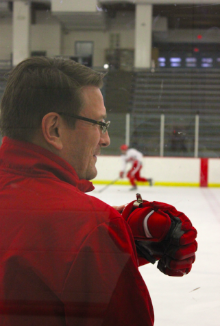 Head boys' hockey coach Ken Pauly presides over practice. 