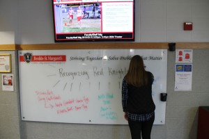 The white board in the main lobby now serves as a way to recognize students who have helped their community through their service work.