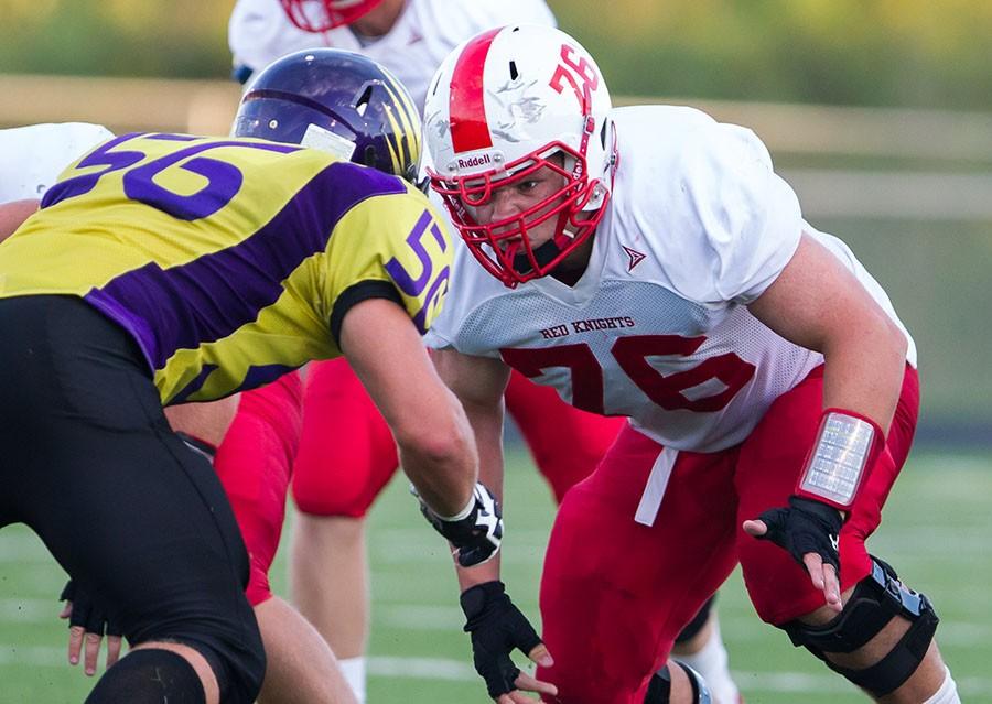 Rooney+blocks+a+lineman+from+Chaska+in+an+early+season+matchup.+
