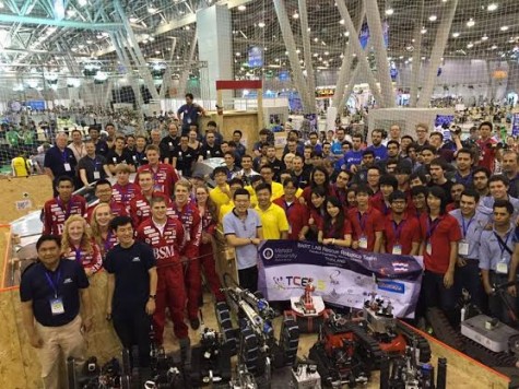 BSM graduates pose with their competitors and bot at the 2015 robocup in Hefei, China.