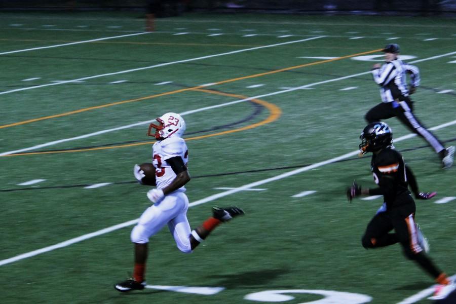 Floyd breaks free against a St. Louis Park defender in a game in which he came up just 5 yards short of the MN single game rushing record.