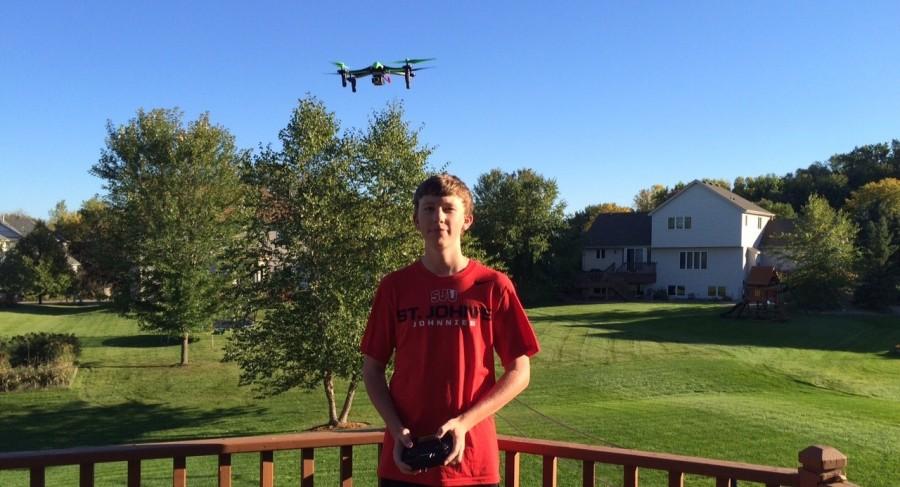 Benning flies his DJI phantom quad copter in his back yard. 