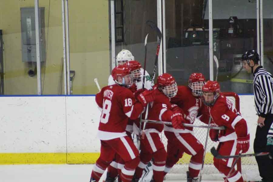The Red Knights celebrate after a goal during a huge win over Hill-Murray.