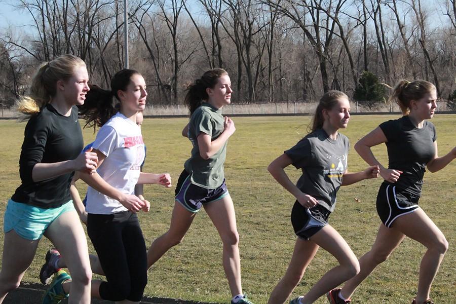 The off-season team stays in shape in the winter and early spring by doing workouts after school like doing intervals on the track.