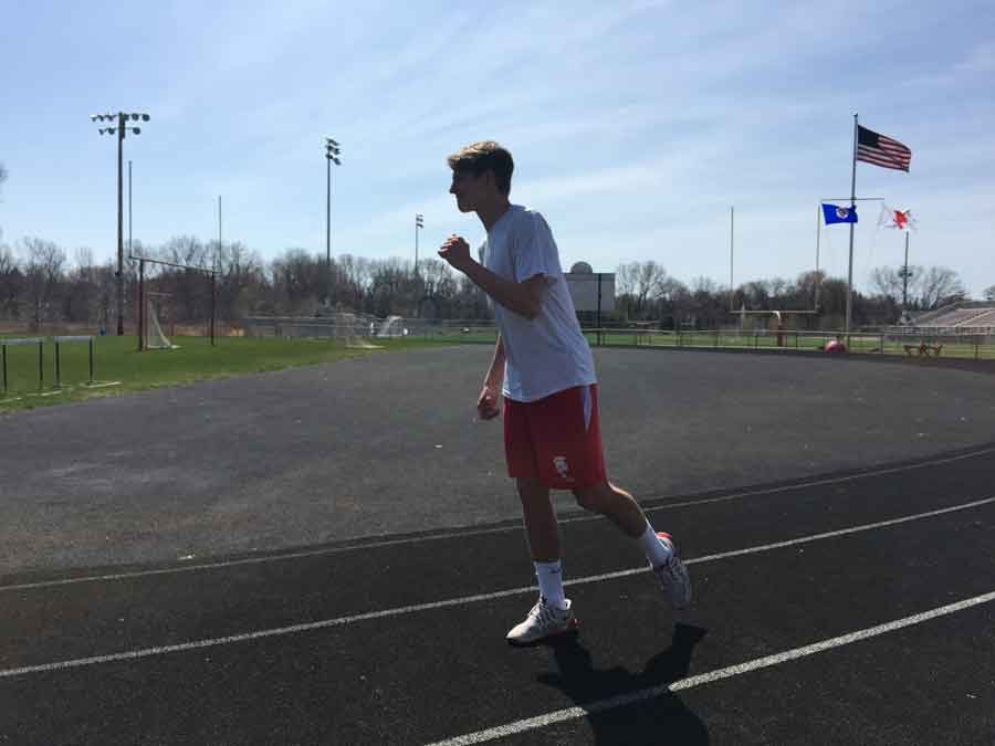 Senior track captain and lacrosse player Bill Lichliter excels in both sports while still keeping up with his academics.