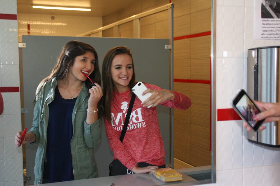 Juniors Ashley Ortizcazarin and Lauren Beh visit the girls bathroom and spend hours talking selfies and throwing shade.