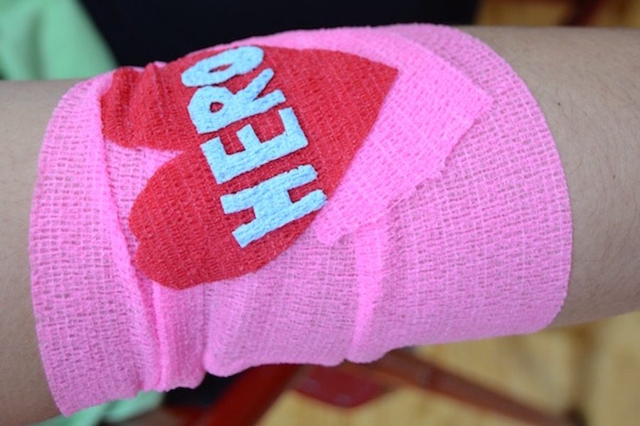 Students that met the requirements donated blood at NHSs semiannual blood drive. After donating blood, students received stylized bandages.