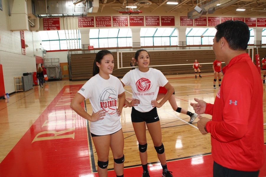 Anna and Sarah Luong love the relationship they have with their coach and father, Phong.