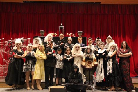 The cast of The Addams Family flash Morticia Addams signature pose after bringing home multiple individual awards and technical awards.