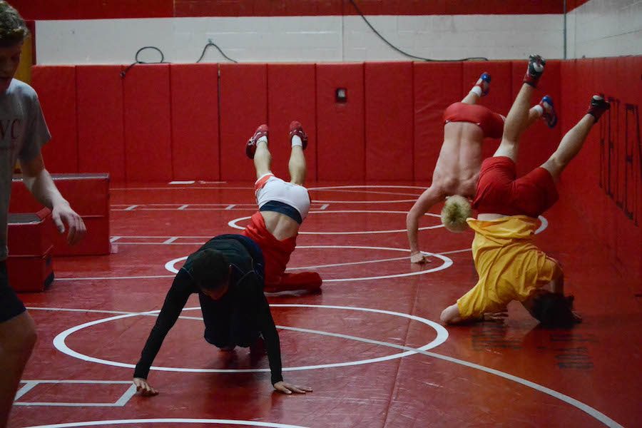 The Wrestling team engages in intense practices in the Wrestling room every day after school to ensure they reach their goals at the end of the season.