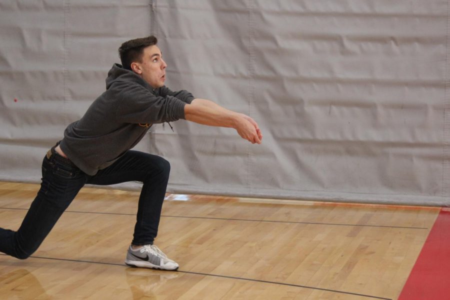 Krane tries his best in varsity volleyball practice. 