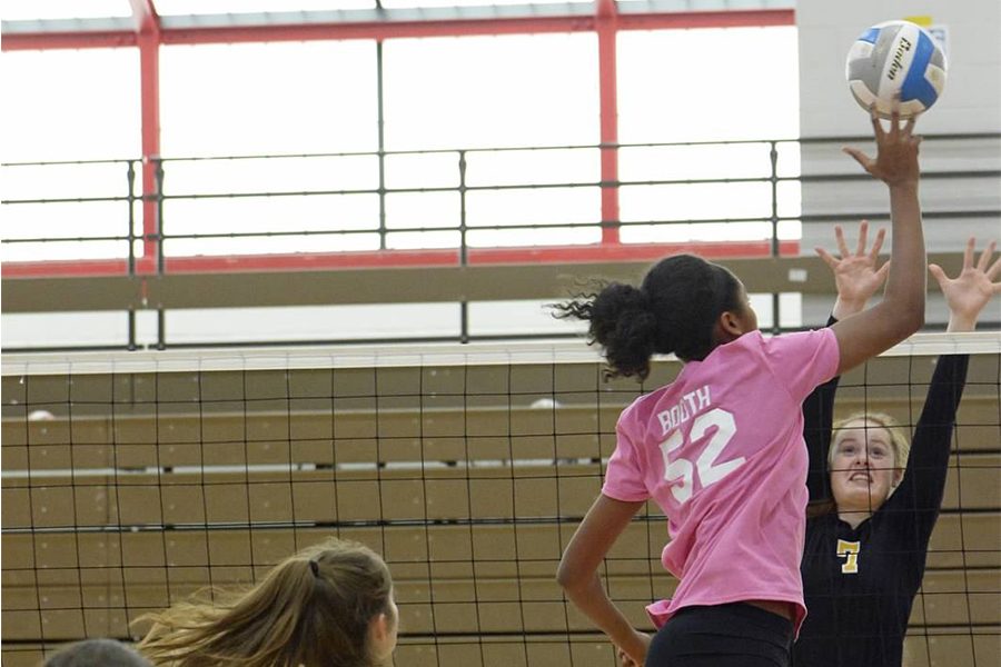 Eighth grader Carter Booth dominated on the varsity volleyball court this past season
