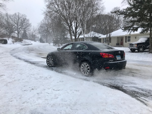 As snow accumulates, drivers struggle to navigate icy roads 