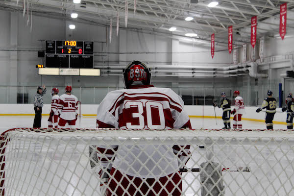 Freshman Carson Limesand standing in the crease