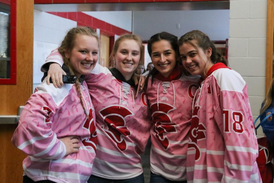 Girls+hockey+wore+matching+jerseys+in+preparation+for+their+stick+it+to+cancer+game.