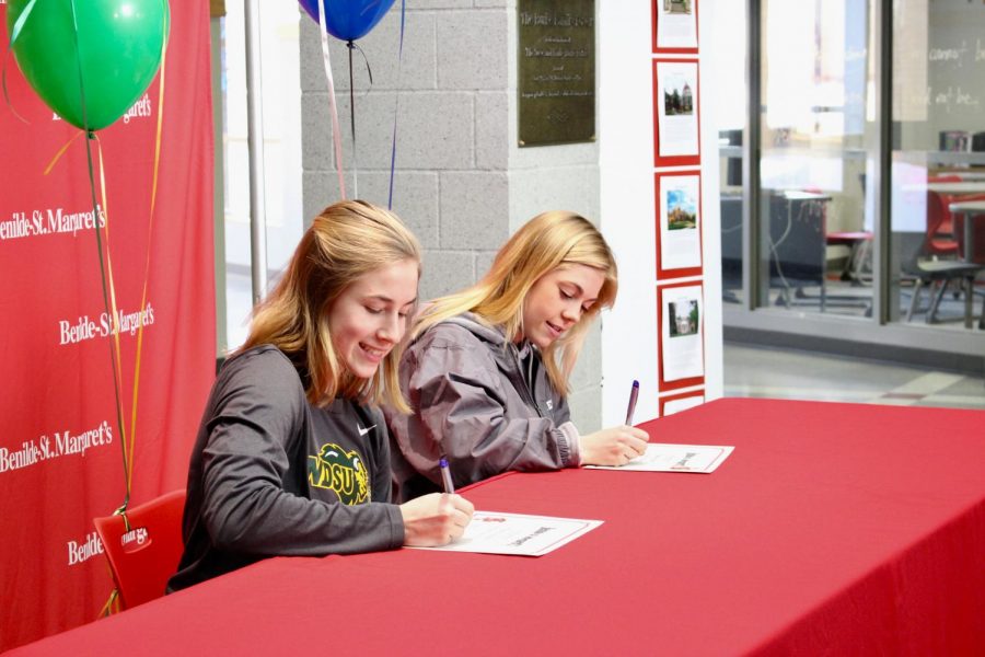 Seniors Claire Grazzini and  Maddie Stoks signed commitments to their college sports.