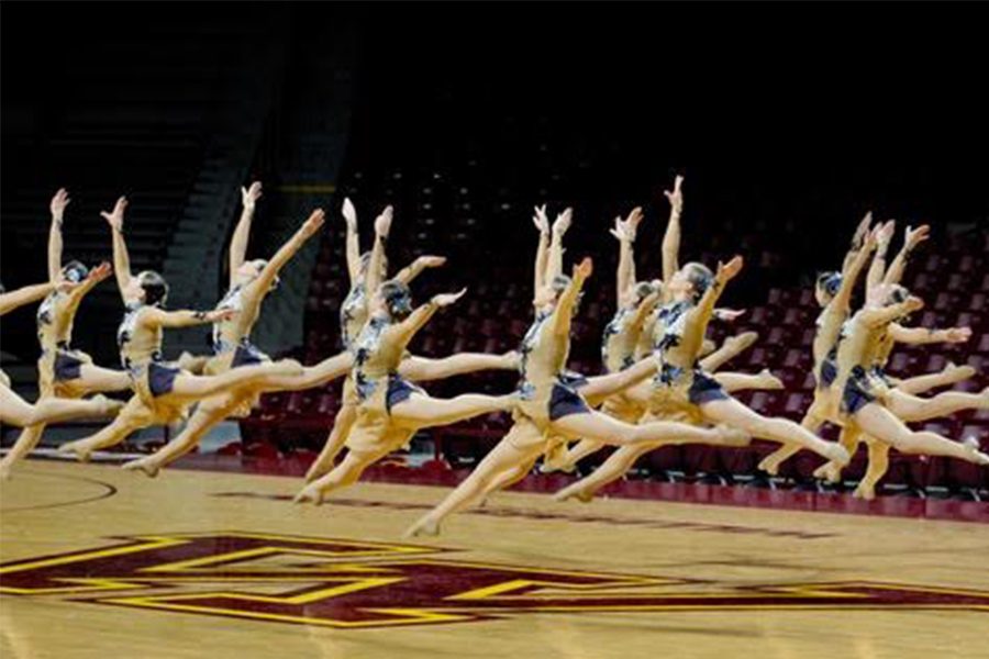 Knightettes leap during the dance at 
