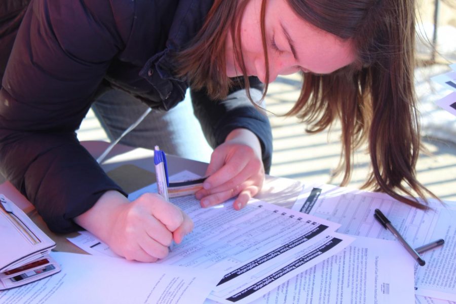 Students register to vote during the nationwide walkout.