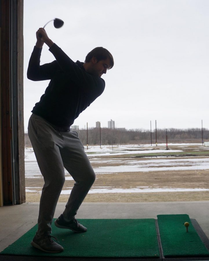 Senior Max Byzewski and the other golfers practiced indoors.