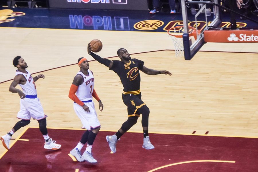 Lebron James doing a massive dunk