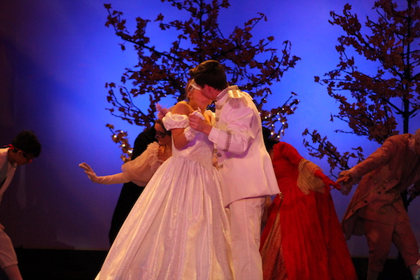 Cinderella and Prince Topher share a kiss. Cinderella was played by senior Brielle Baker, and Prince Topher was played by senior Will Krane.