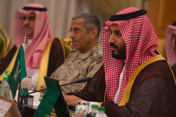 Mohammad bin Salman, the crown prince of Saudi Arabia, sitting at a conference. He has not claimed responsibility for Khashoggi's death.