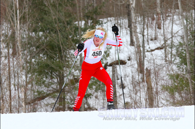 Ava Schieffert pushes up a slope toward the finish line.
