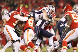 Patriots #34 Rex Burkhead dives over the goal-line for a late game touchdown.