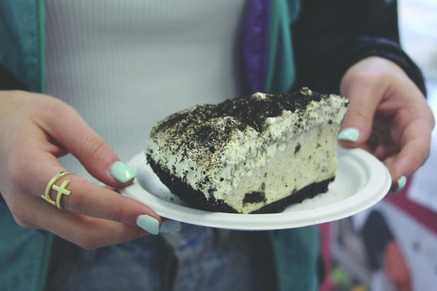 This is a piece of cookie and cream pie held by Senior Alexa Field. Sol thinks that pie is the superior dessert, but his fellow editors disagree, and have their own opinions on the best dessert––hence, why this debate exists (despite the fact that Sol is obviously right). This dessert is provided by Taher, along with many more.