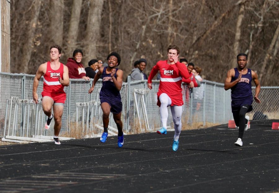 BSM Red Knights sprint down the track during one of their first meets this season.