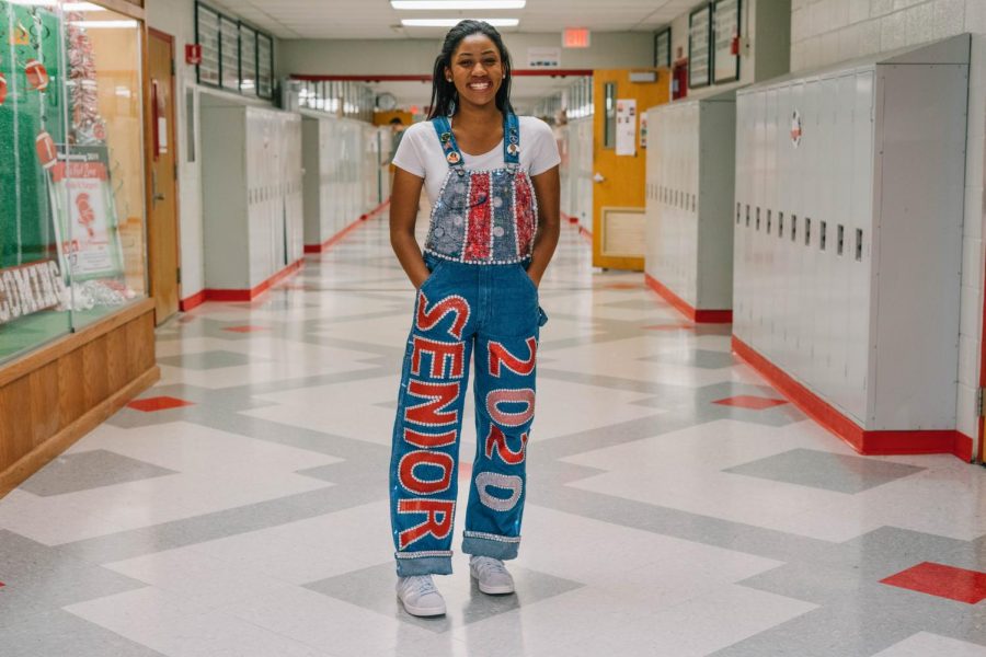 Senior Breah Banks, whose overalls literally light up, spent over 10 hours making them.