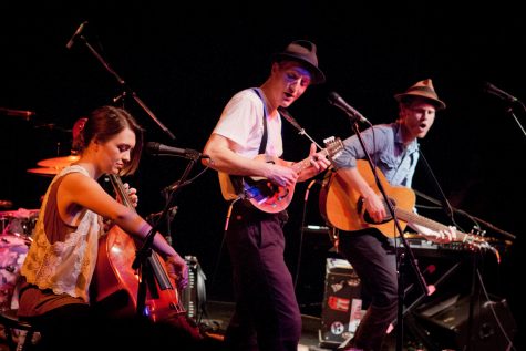 The Lumineers perform at Fairfield Theatre Company in Fairfield, Connecticut. Wesley Schultz on acoustic guitar (right), Jeremiah Fraites on mandolin (middle), Neyla Pekarek on cello (left). in 2012
