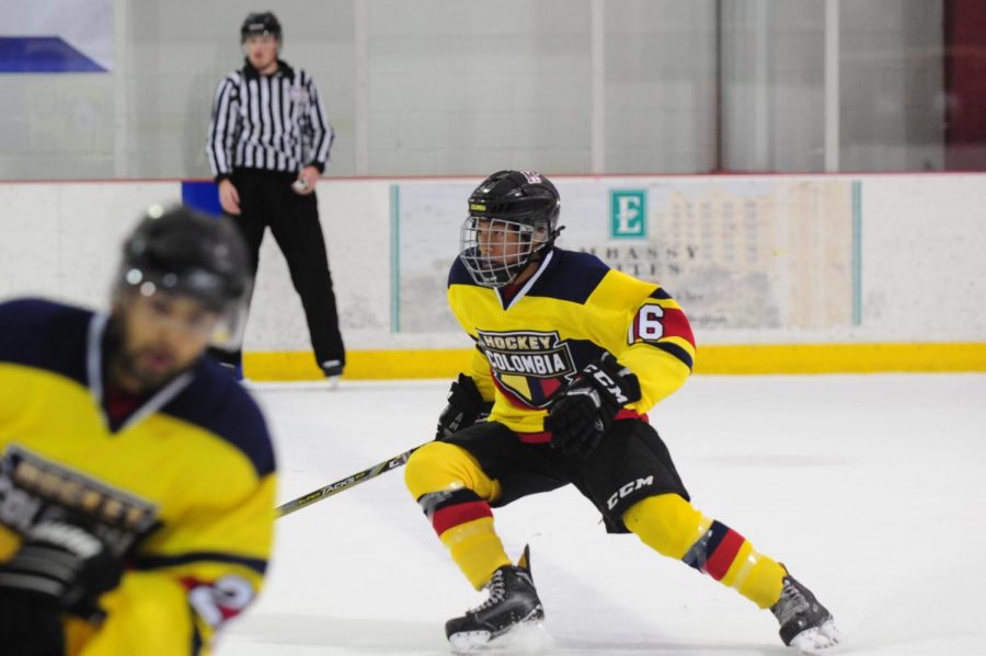 Sophomore Leo Warner plays for the Columbian hockey team in a international competition.