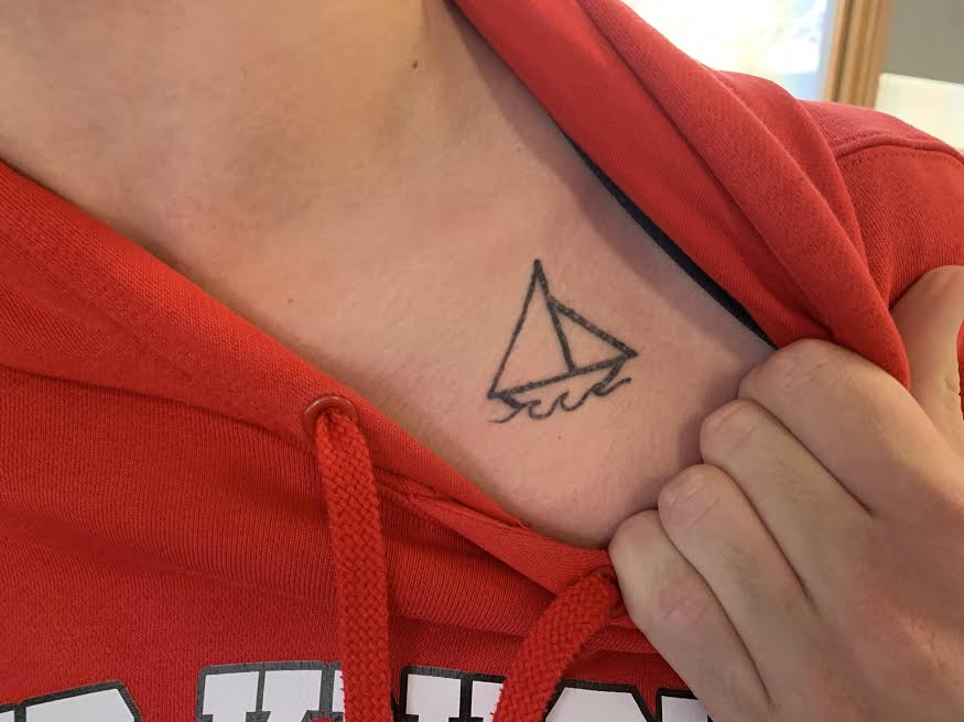 Jack Shields got his tattoo of a boat because he like boats and has always lived on a lake.