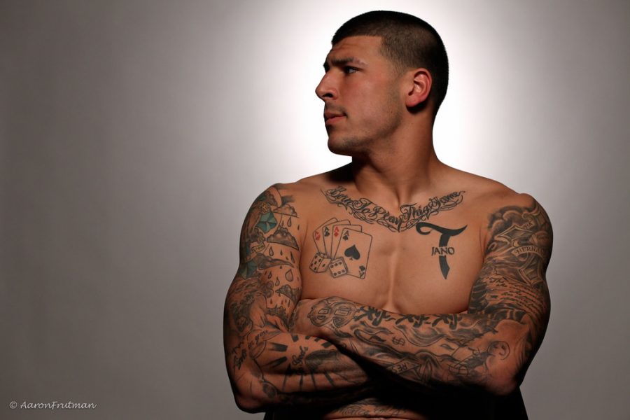 Aaron Hernandez poses for a photo shoot in 2010; the new Netflix documentary exposes his past.