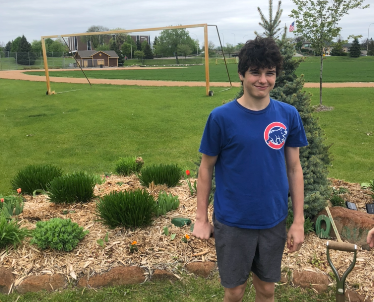 Sophomore+Mitch+Dokman+planted+a+garden+as+his+service+project.